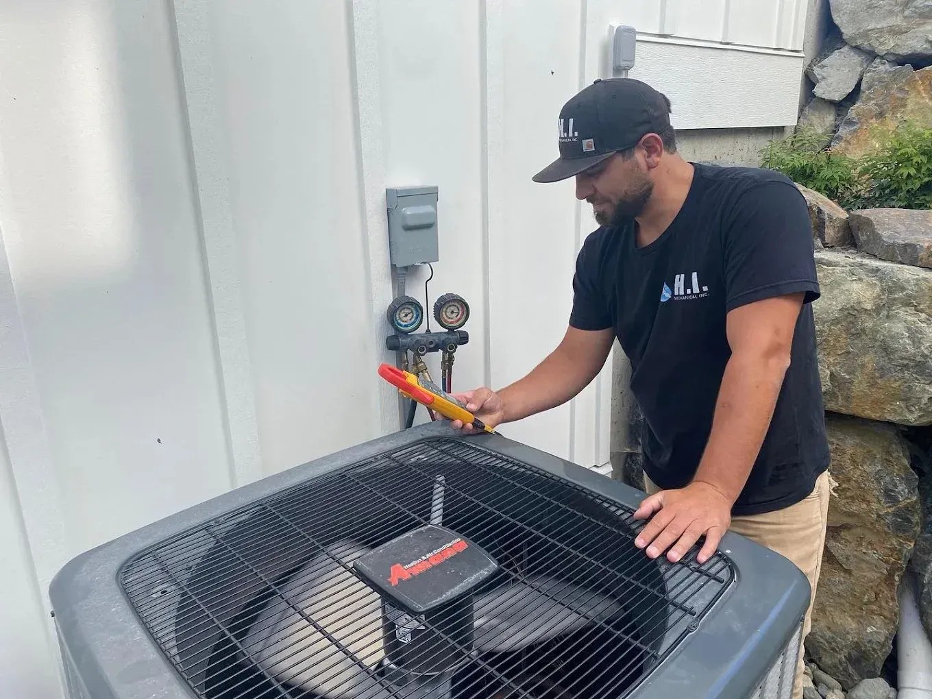 Commercial HVAC Services in Sidney BC 3 HVAC technician assessing a commercial HVAC unit for repairs